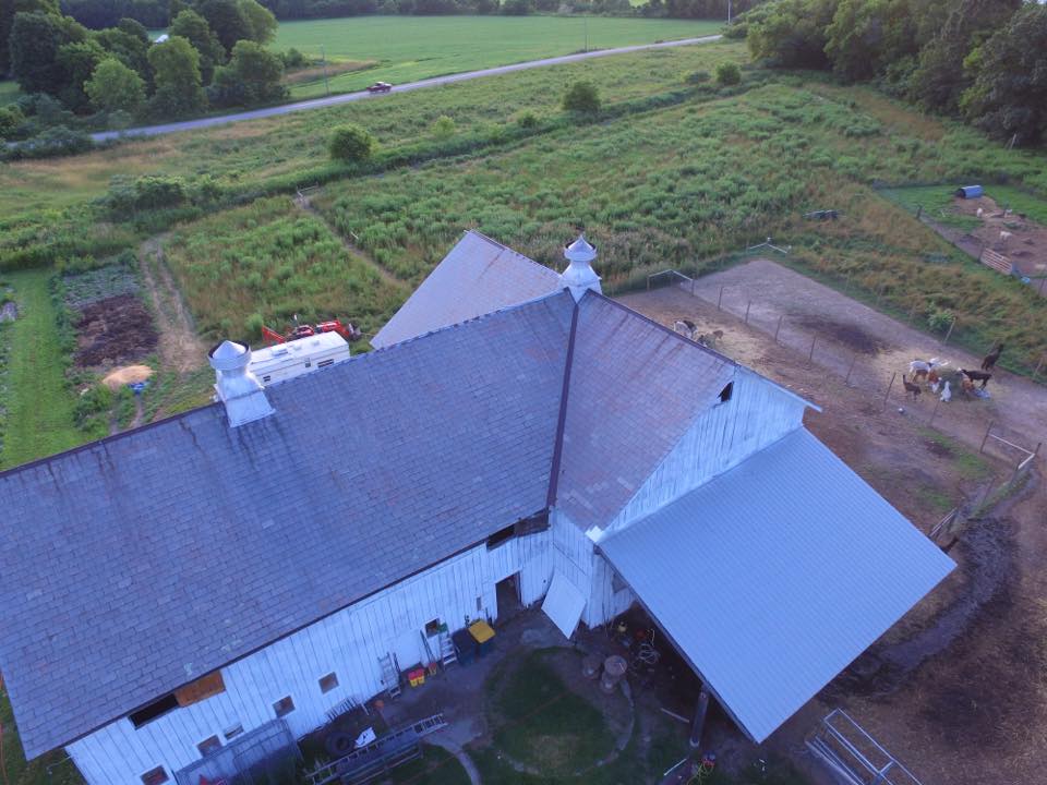Aerial view of Hickory Hill Fiber Farm barn and pastures, Petersburg NY